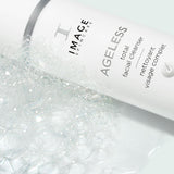 AGELESS total facial cleanser bottle with bubbles