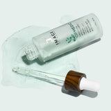 ORMEDIC antioxidant serum open bottle with product